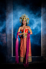 Portrait of asian woman wear ancient thai dress style and makeup ghost face at the old castles at night scene,Thailand people