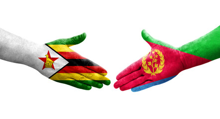 Handshake between Eritrea and Zimbabwe flags painted on hands, isolated transparent image.