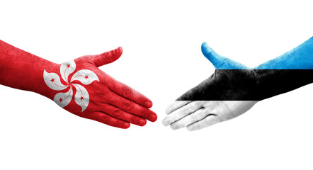 Obraz premium Handshake between Estonia and Hong Kong flags painted on hands, isolated transparent image.