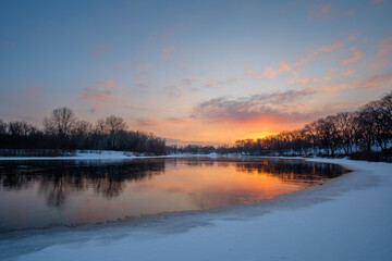 february sunrise over the lake