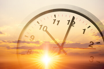 Fototapeta na wymiar sunrise sky with clock face for begining day times concept