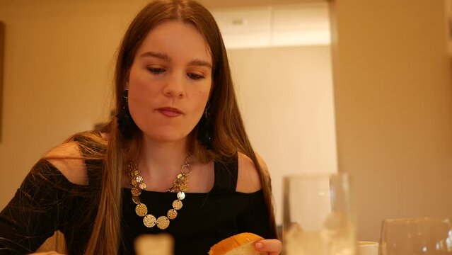 Attractive Woman Eating Dinner At Fancy Restaurant Or Country Club