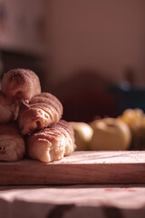 Homemade rural cakes on a wooden board in a rural atmosphere. Cake in the old kitchen