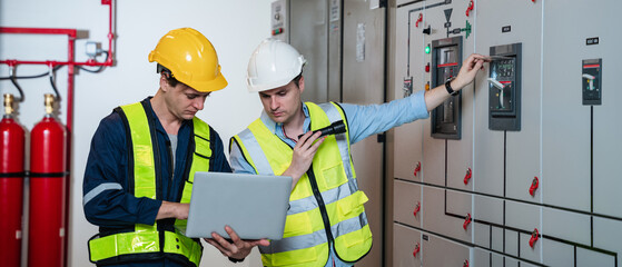 A team of experts checked at the electrical switchboard and check the integrity of the system in...