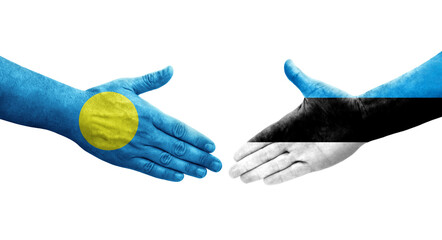 Handshake between Estonia and Palau flags painted on hands, isolated transparent image.