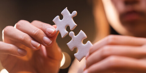 Concept of integration and startup with puzzle pieces merger with teamwork of business worker...