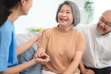 Fototapeta premium health insurance of retired assistance concept, woman nurse or doctor help support senior patient at home, medicine caregiver having medical health care for elderly female to happy care at home