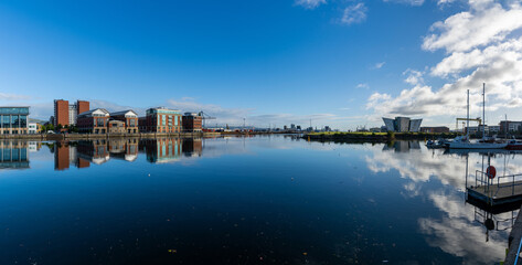 skyline of downtown Belfast and the River Lagan with the Titanic Museum in the background