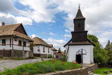 view of the historic village center and old church in Holloko