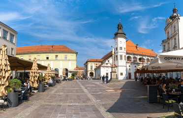 Fototapeta na wymiar view of the historic city center of Maribor with town square and church and outdoor restaurants