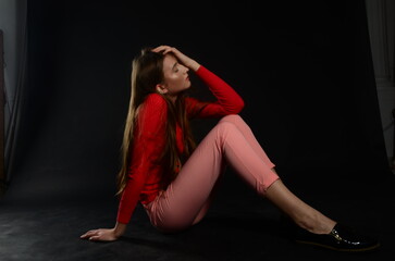 beautiful young caucasian woman portrait on black background