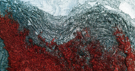 Frozen rock texture. Rough abstract background. Winter snow frost. White red gray color sparkling glitter particles wallpaper with free space.
