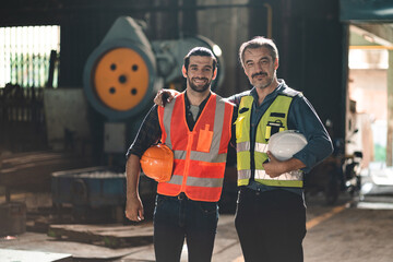 professional technician engineer working to check safety system of heavy industry manufacturing...