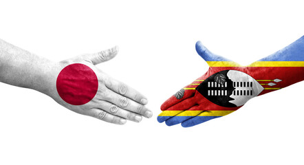 Handshake between Eswatini and Japan flags painted on hands, isolated transparent image.