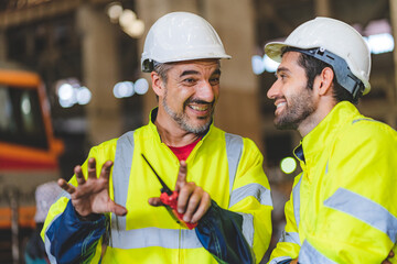 industrial factory with men at work concept, professional engineer foreman inspector talking in business occupation job teamwork with team, construction manager working in manufacturing technology job