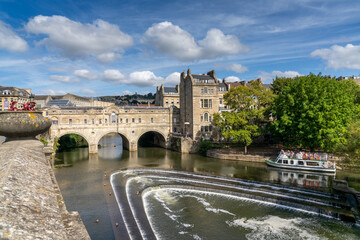 view of the River Avon and Pulteney Bridge in the historic city center of Bath