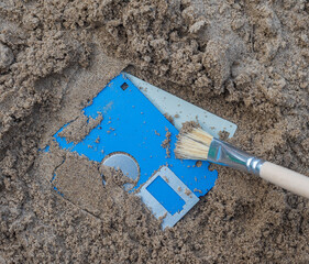 neat cleaning with a floppy floppy disk found in the sand.