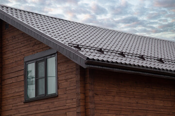 Metal tile.Roof for the house. Modern coatings for the roof of the house.