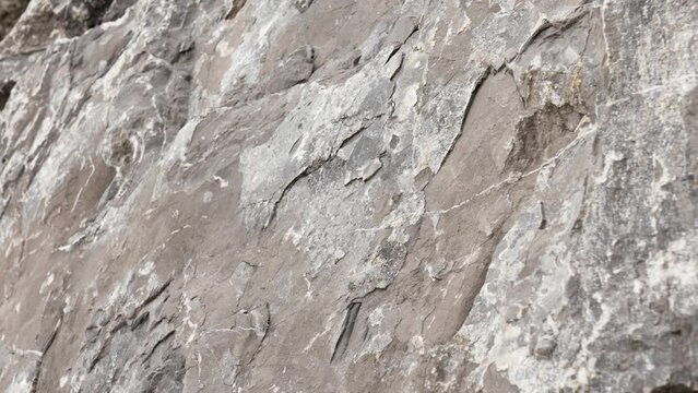 Rough texture of old eroded mountain rock with aged grunge surface