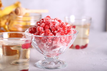 viburnum with sugar is on the table. a useful addition to tea. red viburnum.