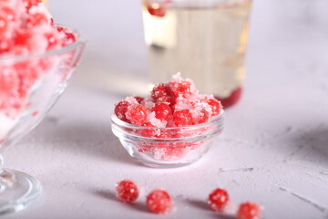 viburnum with sugar is on the table. a useful addition to tea. red viburnum.