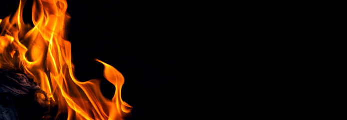 Fire blaze, copy space. Abstract blaze, fire on a black background, flame texture for banner,...