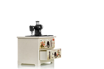 jewelry box with decorative sewing machine on a white background