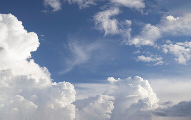 blue sky with big fluffy cumulus clouds