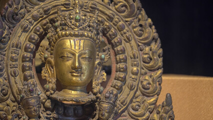 Fototapeta na wymiar bodhisattva avalokiteshvara images The bodhisattva with an ornate vegetal foliage as halo. Lamp of Avalokiteshvara