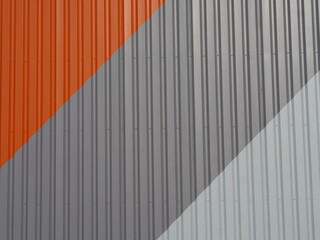 Outer wall made of metal in the colours orange, dark grey, light grey. The colours are arranged...