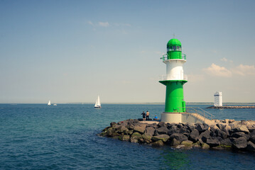 Obraz premium Westmole lighthouse in Warnemünde near Rostock, Germany