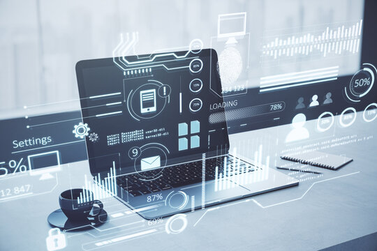 Close up of desktop with laptop, coffee cup and creative glowing business chart interface hologram on blurry background. Company digital data, guide and computer analysis concept. Double exposure.