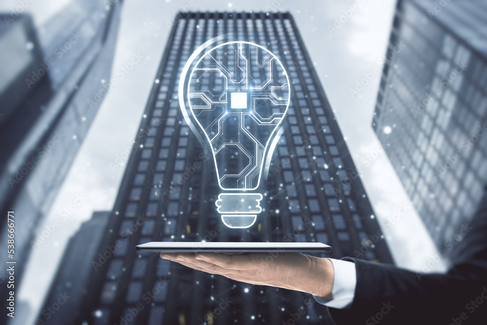 Poster close up of businessman hand holding cellphone with abstract glowing light bulb with chip hologram o