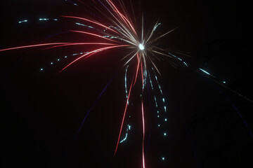 Celebrating holidays and big events with colorful fireworks exploding at the sky. 4th of July, New...