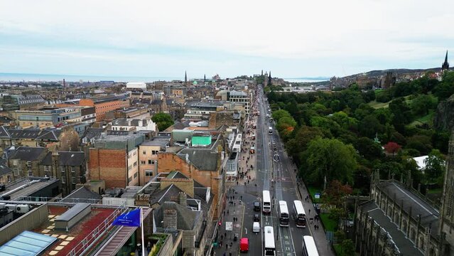 Flight over Princes street in Edinburgh - aerial view - travel photography