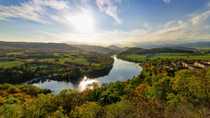 Obraz premium View of the water reservoir Kadan from the lookout point near the lookout tower the Holy Hill (Svatý vrch in Czech) near the town of Kadan - Czech Republic, Europe