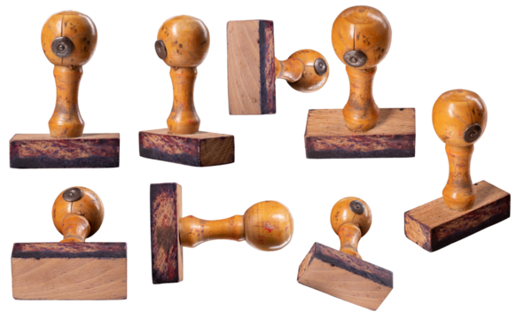 A wooden seal for attaching stamps to documents on an isolated background.
