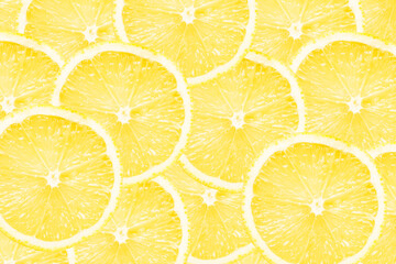 Yellow lemon slices background. Fruit pattern. Cut slices color texture. Lemon fruit section backdrop.
