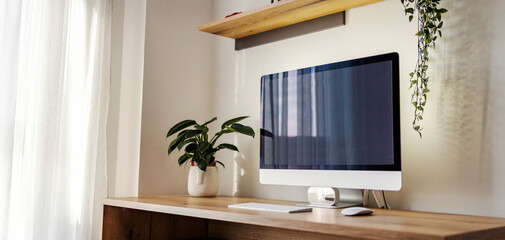 Naklejka na ściany i meble A modern, minimalistic workstation at home.
