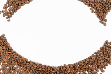 Circle frame of coffee beans isolated on white background, example for advertising.