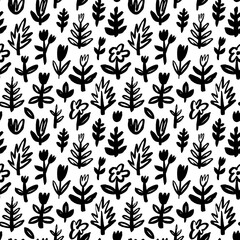 Fototapeta premium Floral seamless pattern in small wild flowers. Vector wild flowers and plants. Hand drawn black botanical ornament. Herbal and meadow plants, field motif. Brush drawn small branches and stems.