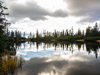 The mountain view is mesmerizing. The water elements such as lakes, waterfalls, or rivers highlight how the mountains have been shaped. 
The color change between autumn and spring is breathtaking!