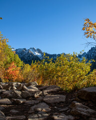 The mountain view is mesmerizing. The water elements such as lakes, waterfalls, or rivers highlight how the mountains have been shaped. 
The color change between autumn and spring is breathtaking!