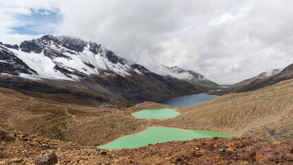 The mountain view is mesmerizing. The water elements such as lakes, waterfalls, or rivers highlight how the mountains have been shaped. 
The color change between autumn and spring is breathtaking!