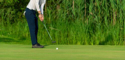 Professional golf player in action. Horizontal sport and golf club, course theme poster, greeting...