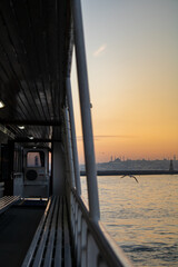 Sunset from the ferry, historical istanbul peninsula and sunset view from the ferry, vertical shot, Istanbul, Turkey. Selective Focus, Grain.
