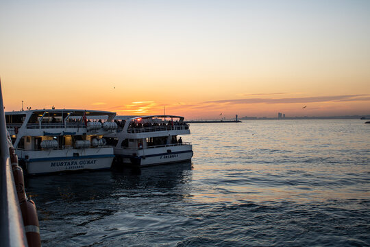 Istanbul, Turkey - February 2022: Boats over the sea and sunset view. Sea and sunset shot.