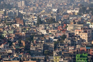 Cityscape of Kathmandu, Nepal surrounded by mountains © Clinton Weaver/Wirestock Creators