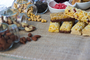 Fototapeta premium Bar with granola, dried fruits and nuts
