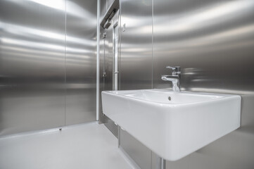 Stainless steel door and walls, clean room with sink